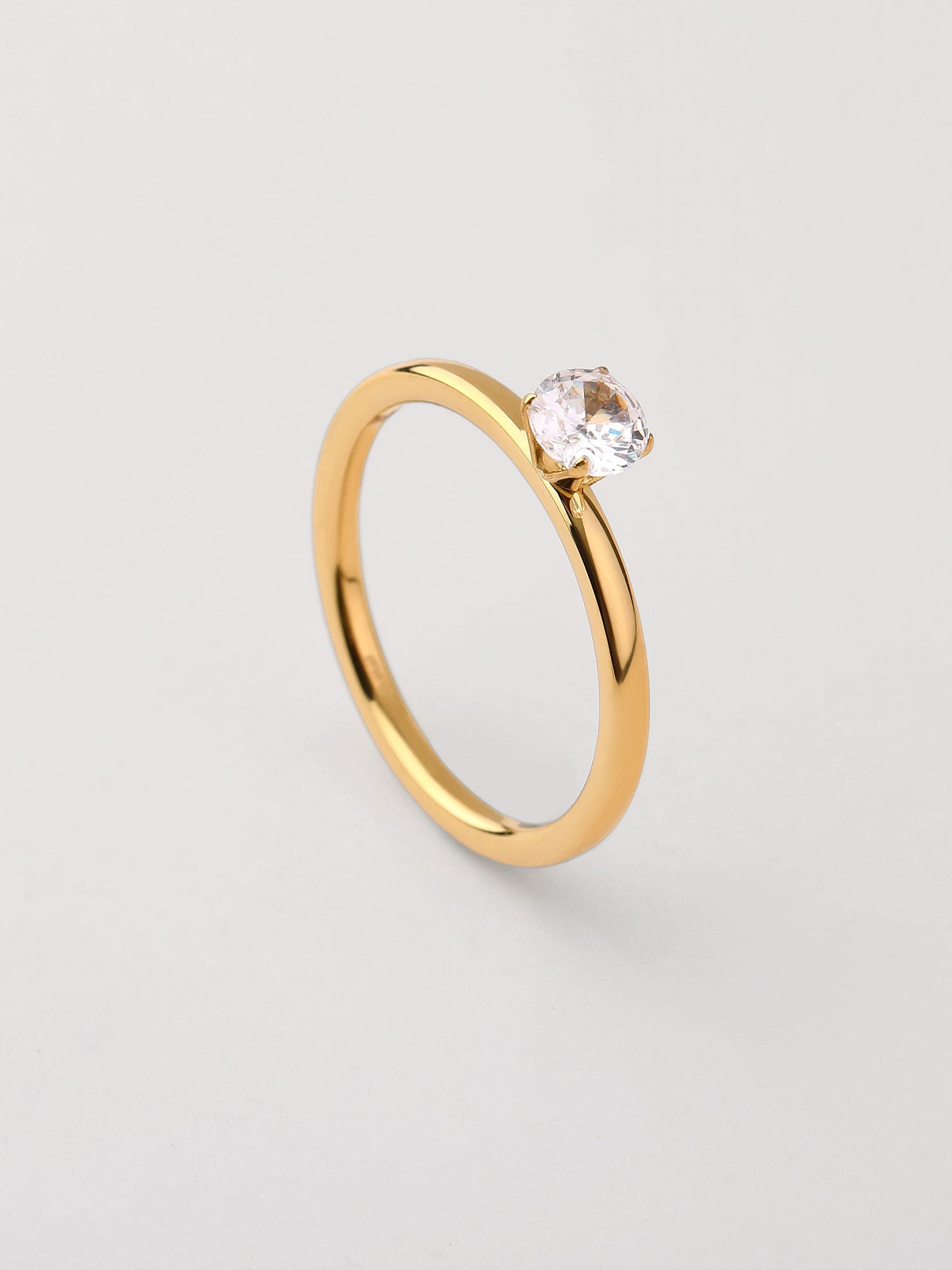 Conjunto de anéis Nexa zircónia dourado