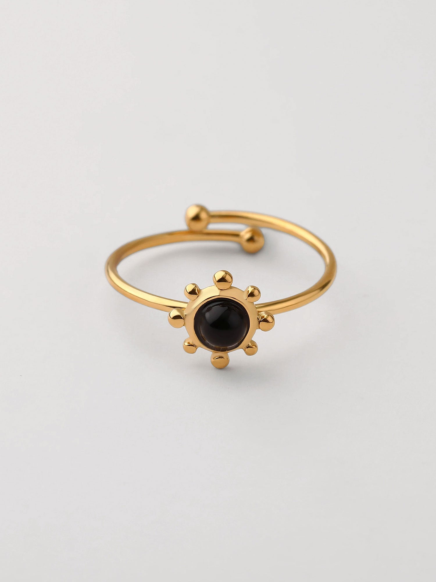 Anel piedra negra natural aberto Dourado