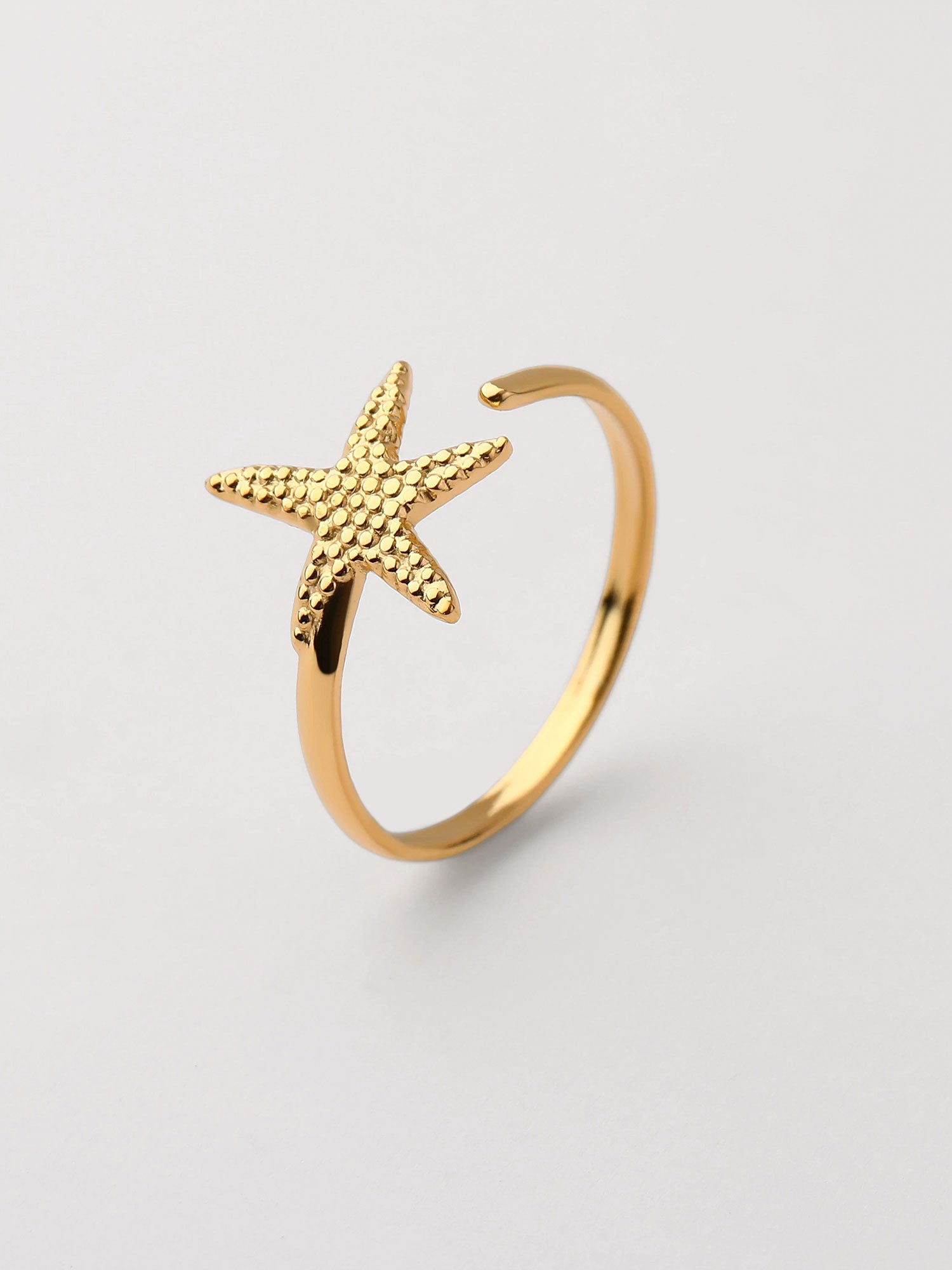 Anel aberto Estrella de Mar Dourado