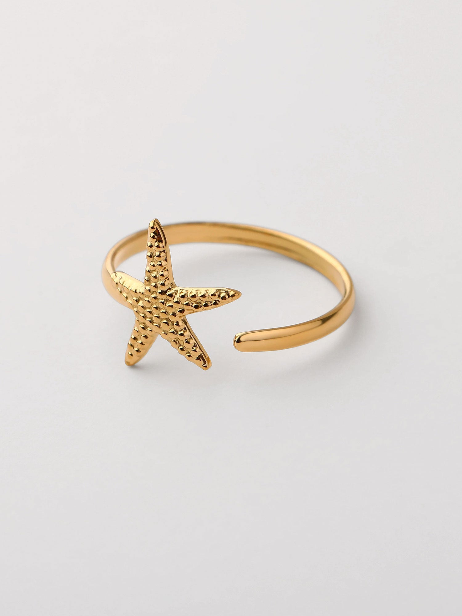 Anel aberto Estrella de Mar Dourado