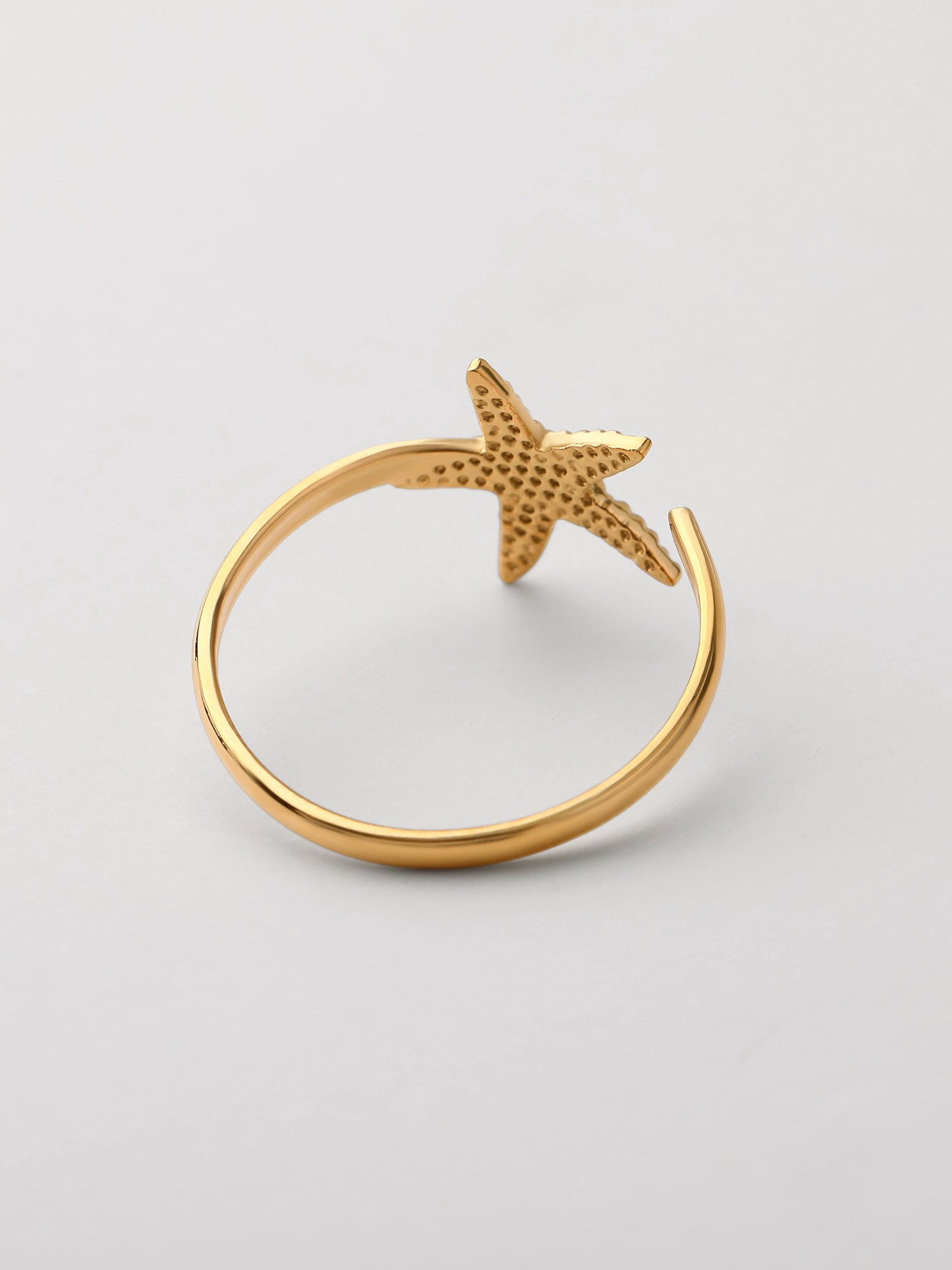 Anel aberto Estrella de Mar Dourado