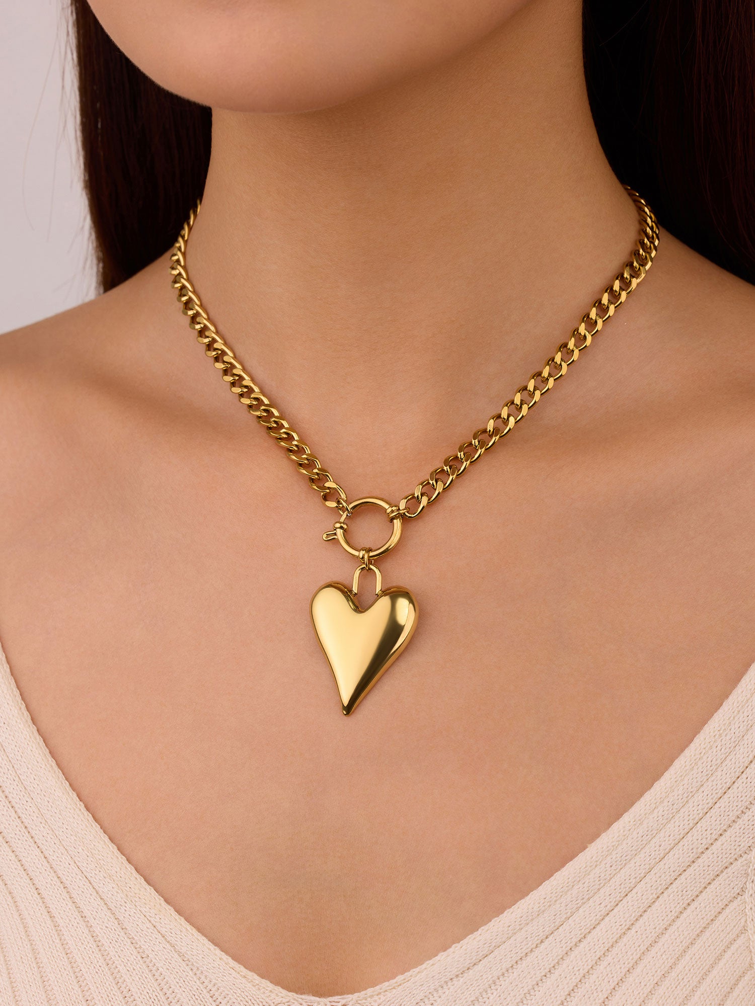 Colar com figura de coração Dourado