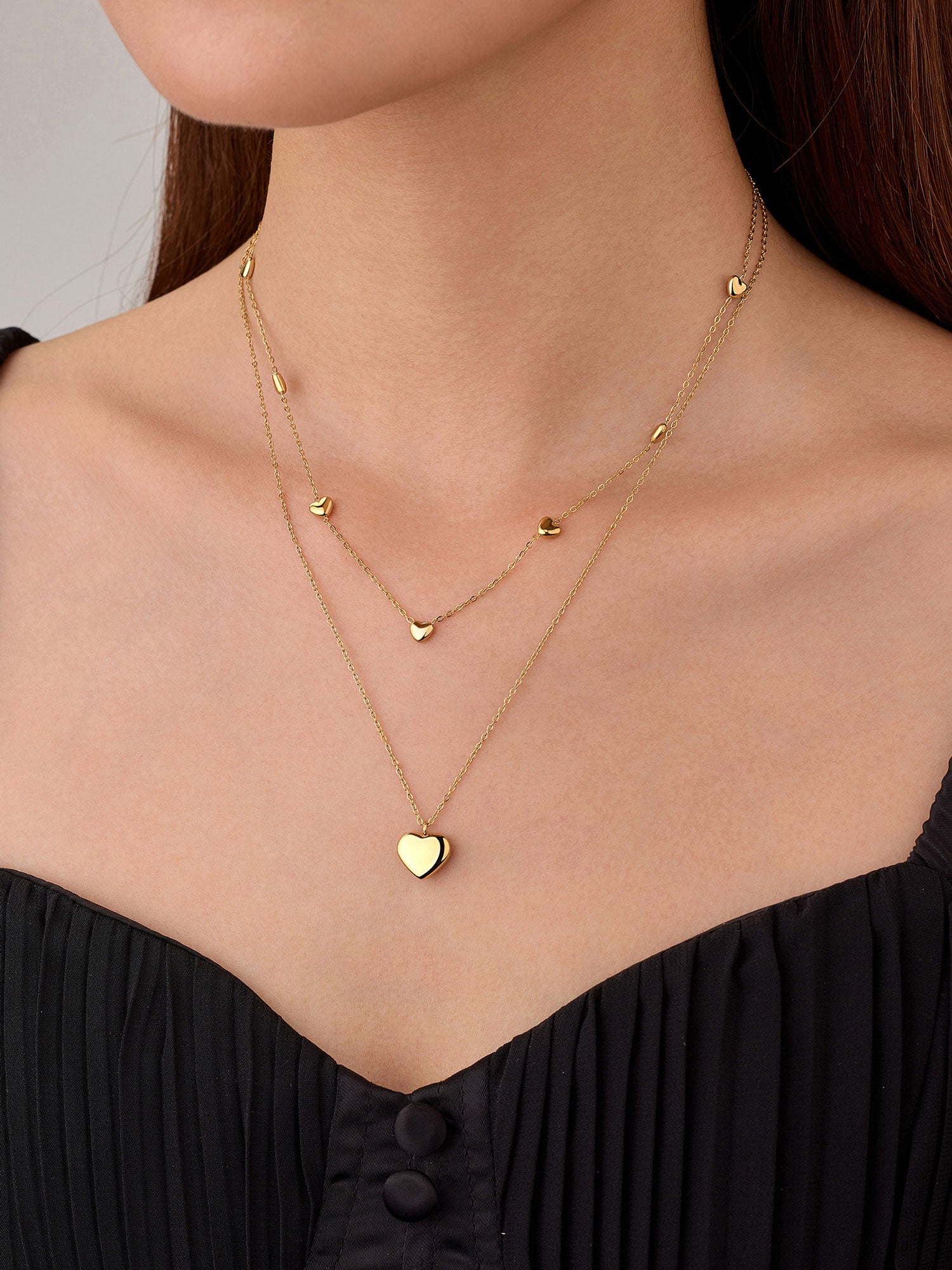Colar Doriel Duplo Coração Dourado Pendente