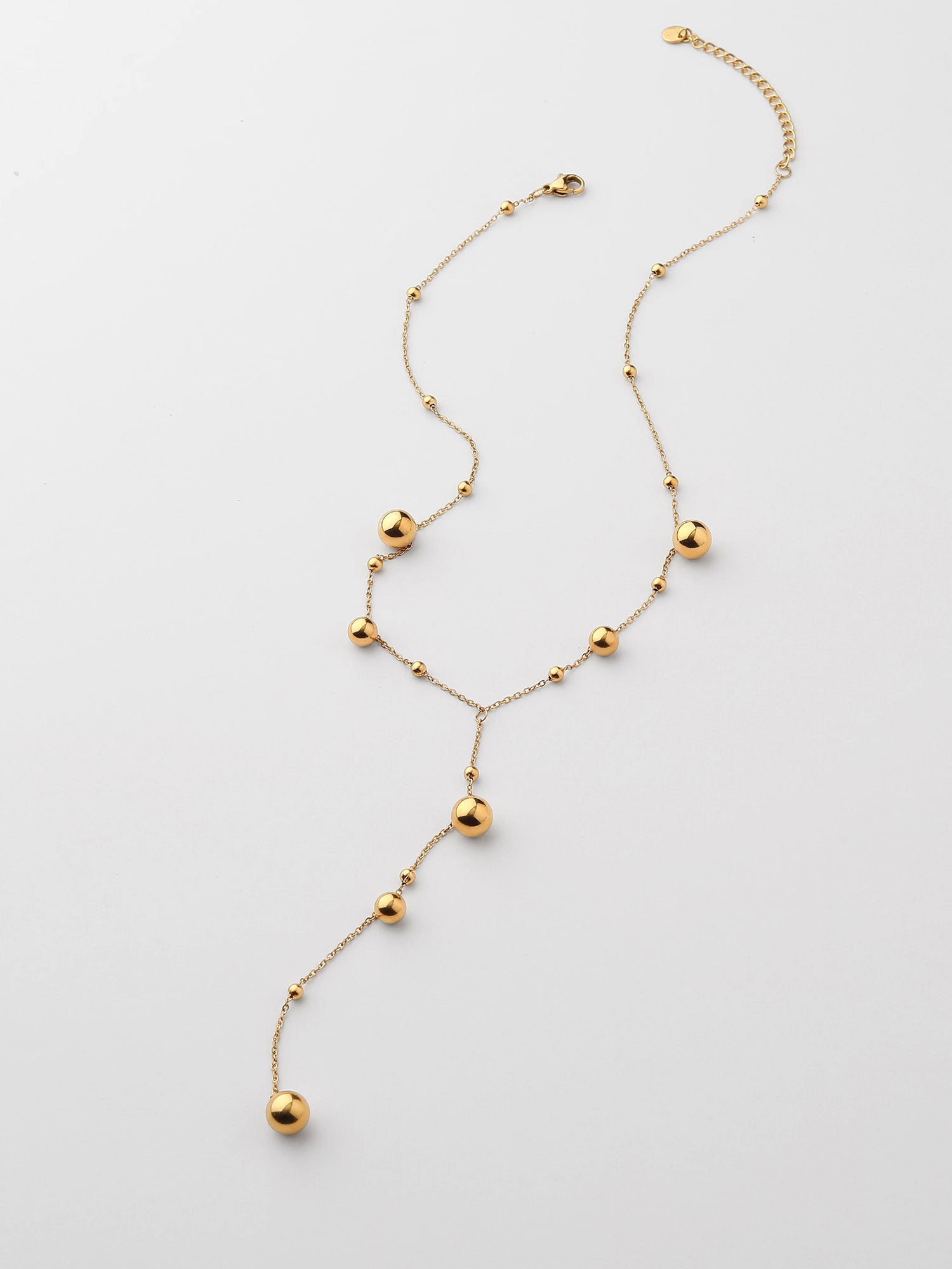 Colar com bolitas longo Dourado