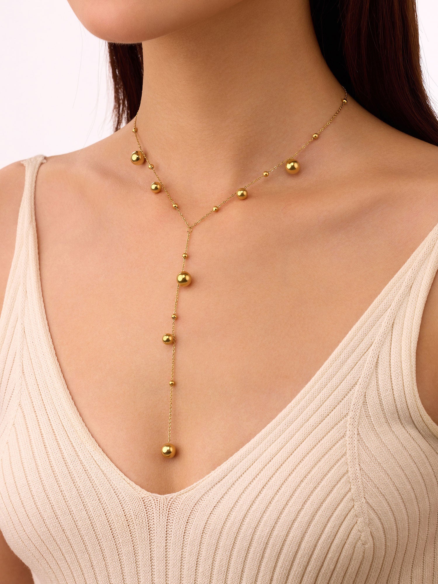 Colar com bolitas longo Dourado