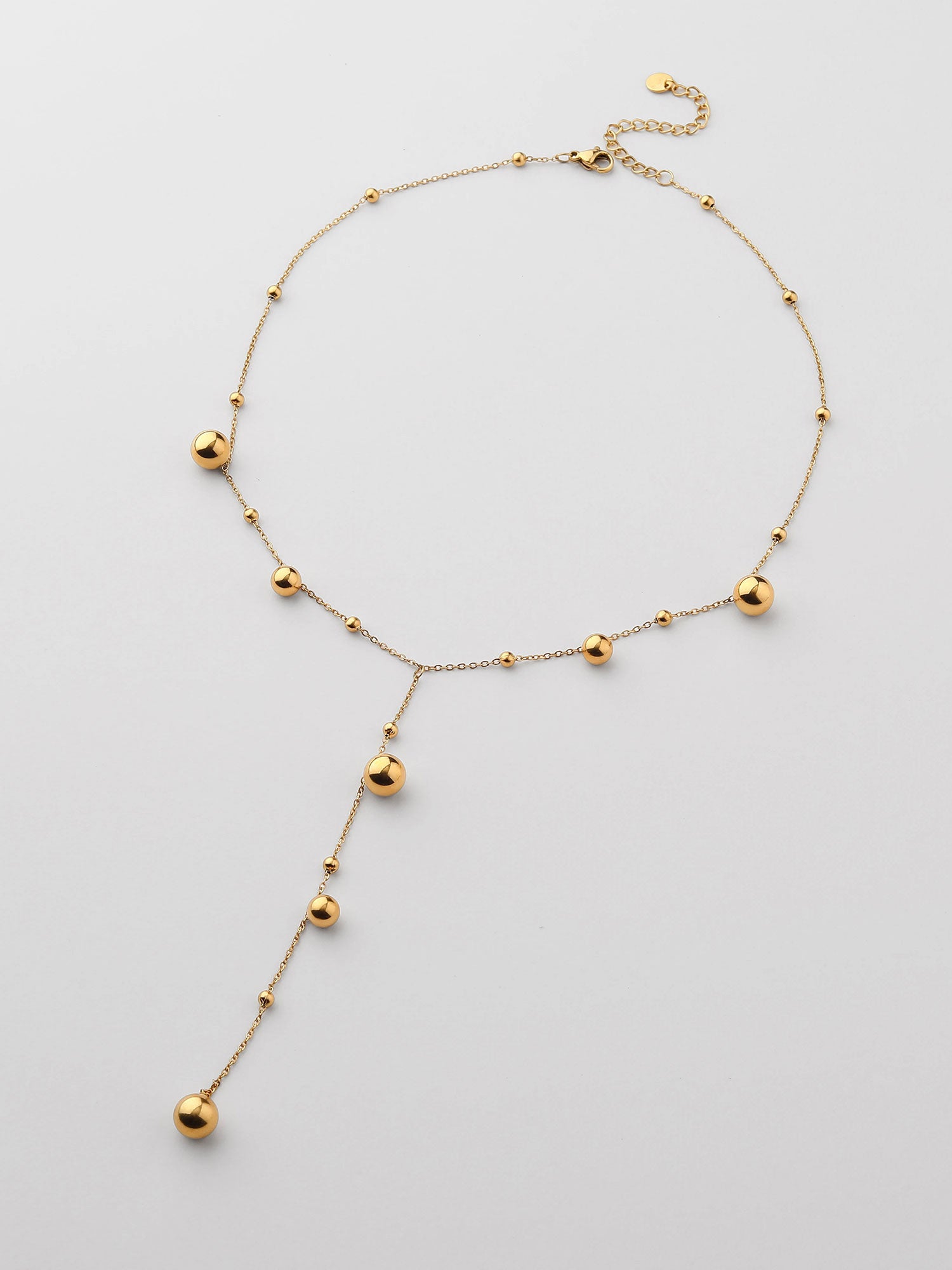 Colar com bolitas longo Dourado