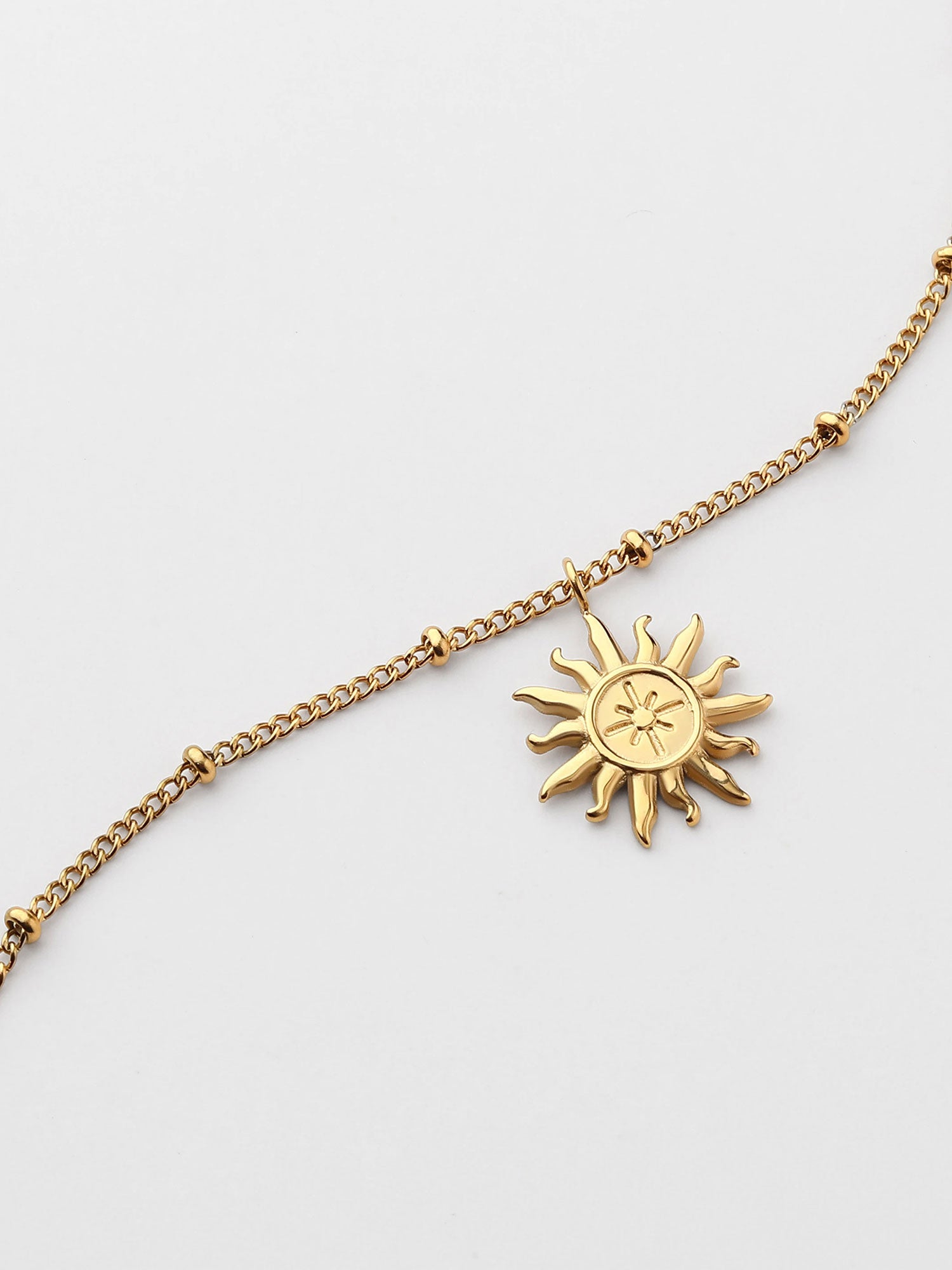 Colar longo com figura de sol Dourado
