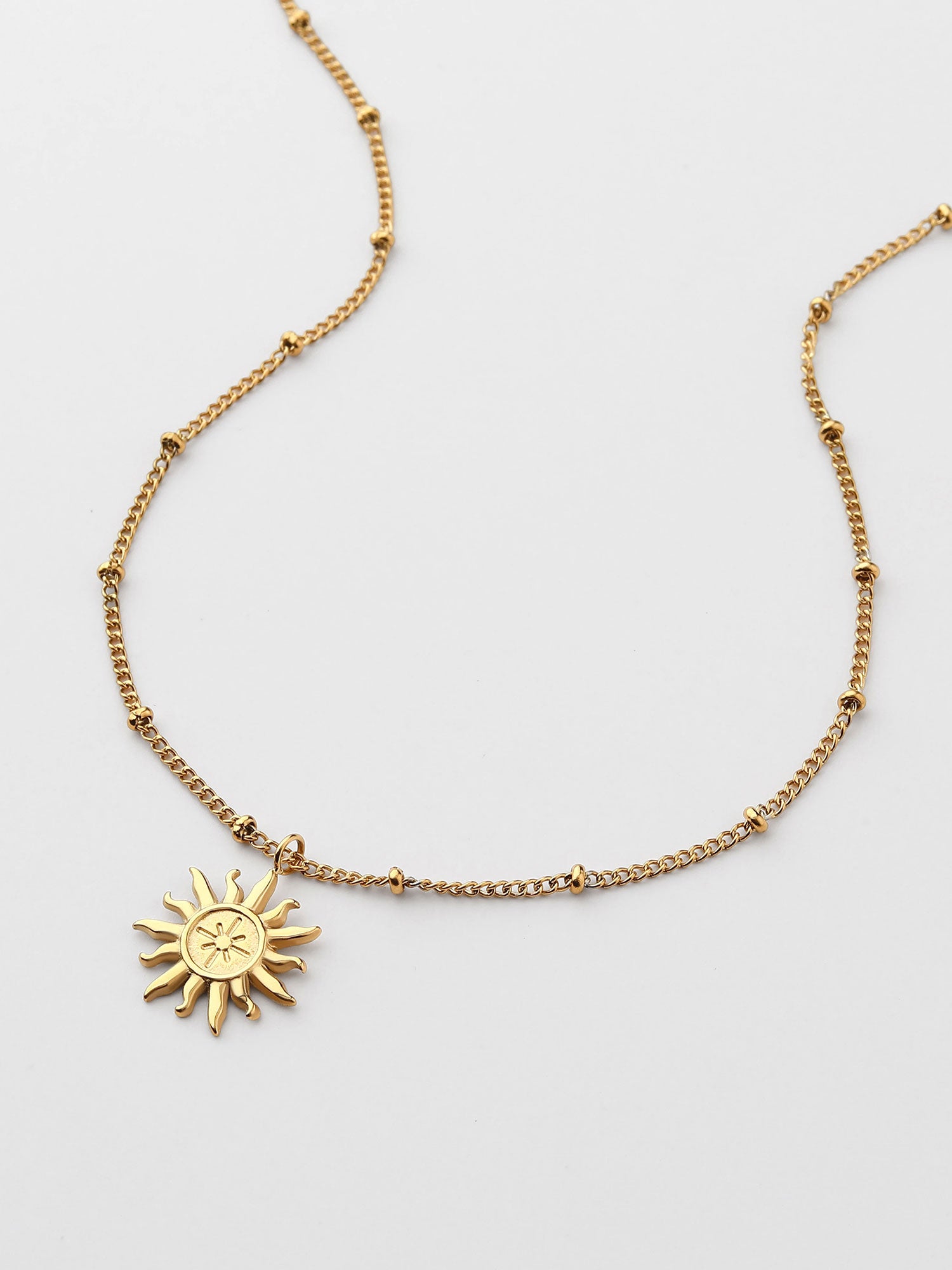 Colar longo com figura de sol Dourado