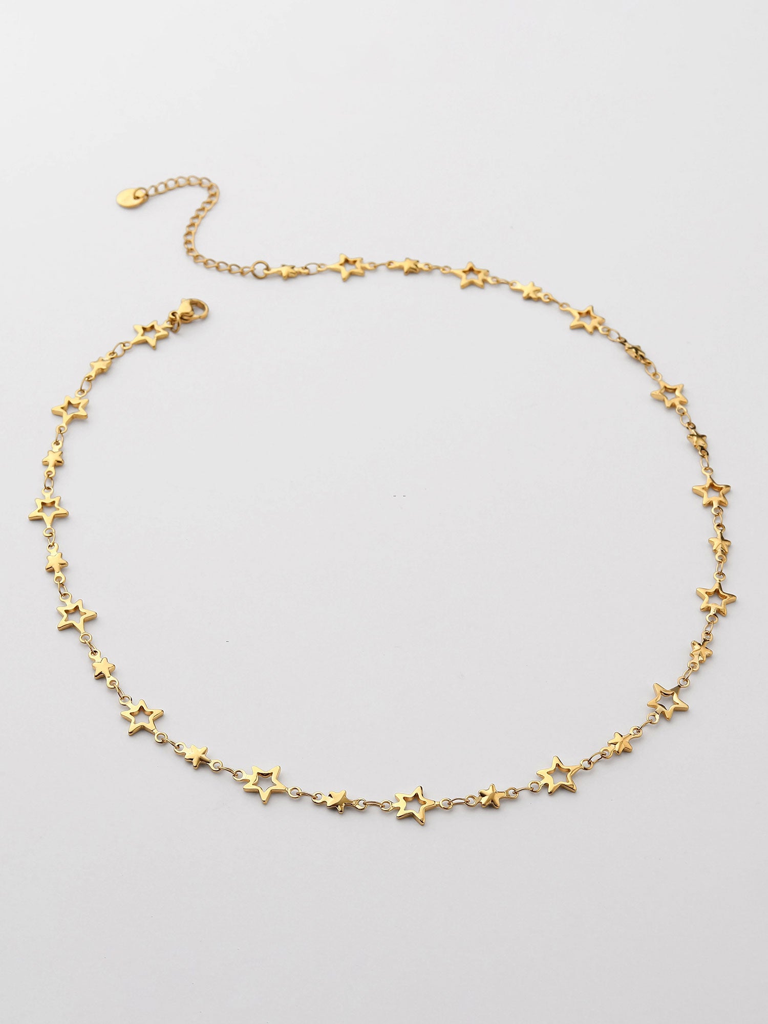 Colar Figuras de Estrela Dourado Curto