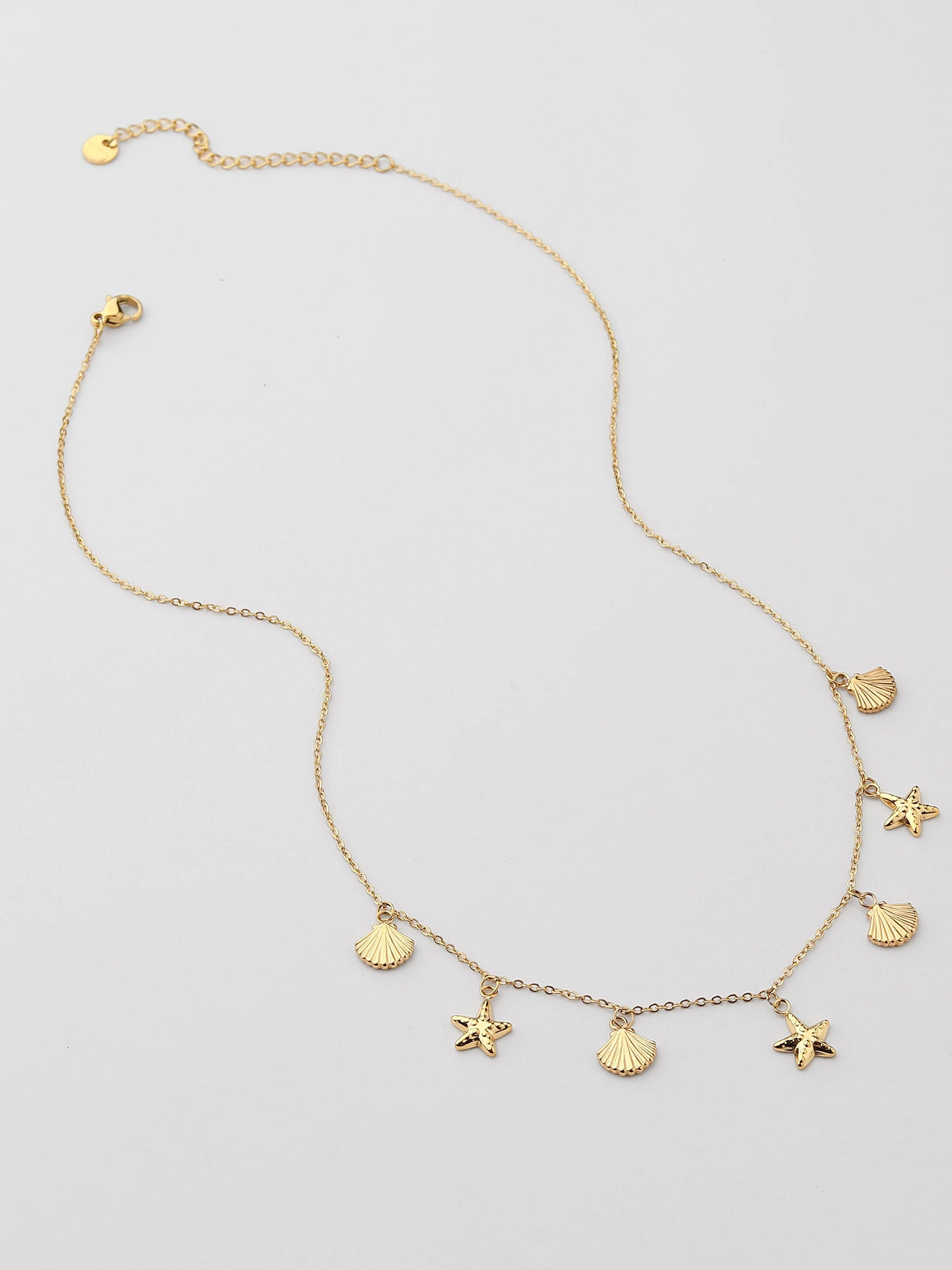 Colar figura praia Dourado