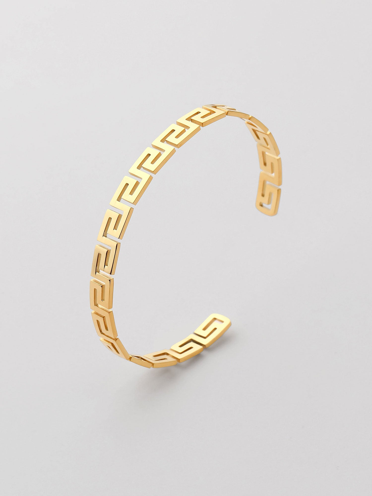 Bracelete aberto com forma geométrica Dourado