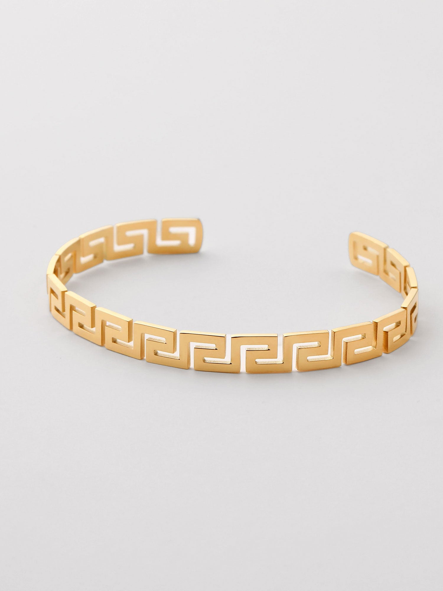 Bracelete aberto com forma geométrica Dourado
