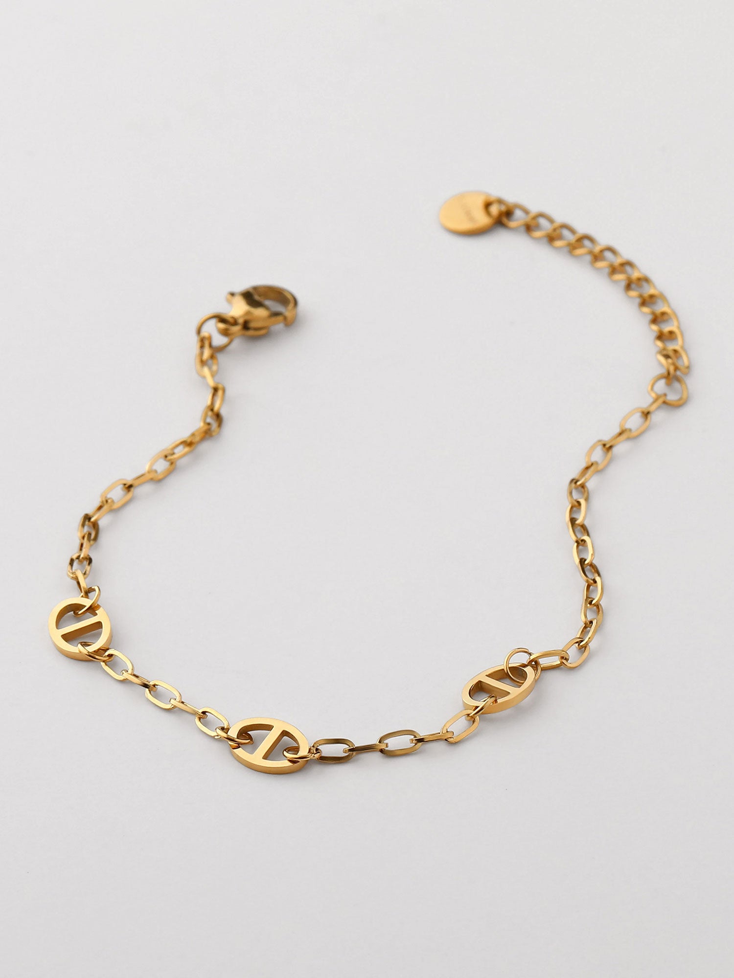 Pulseira corrente fina com figuras dorada