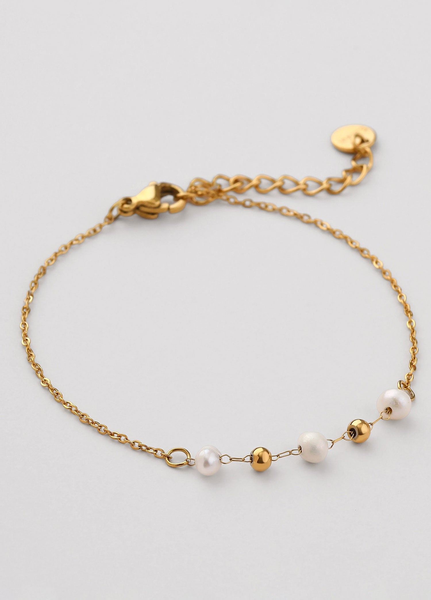 Pulseira de acero inoxidable dorada