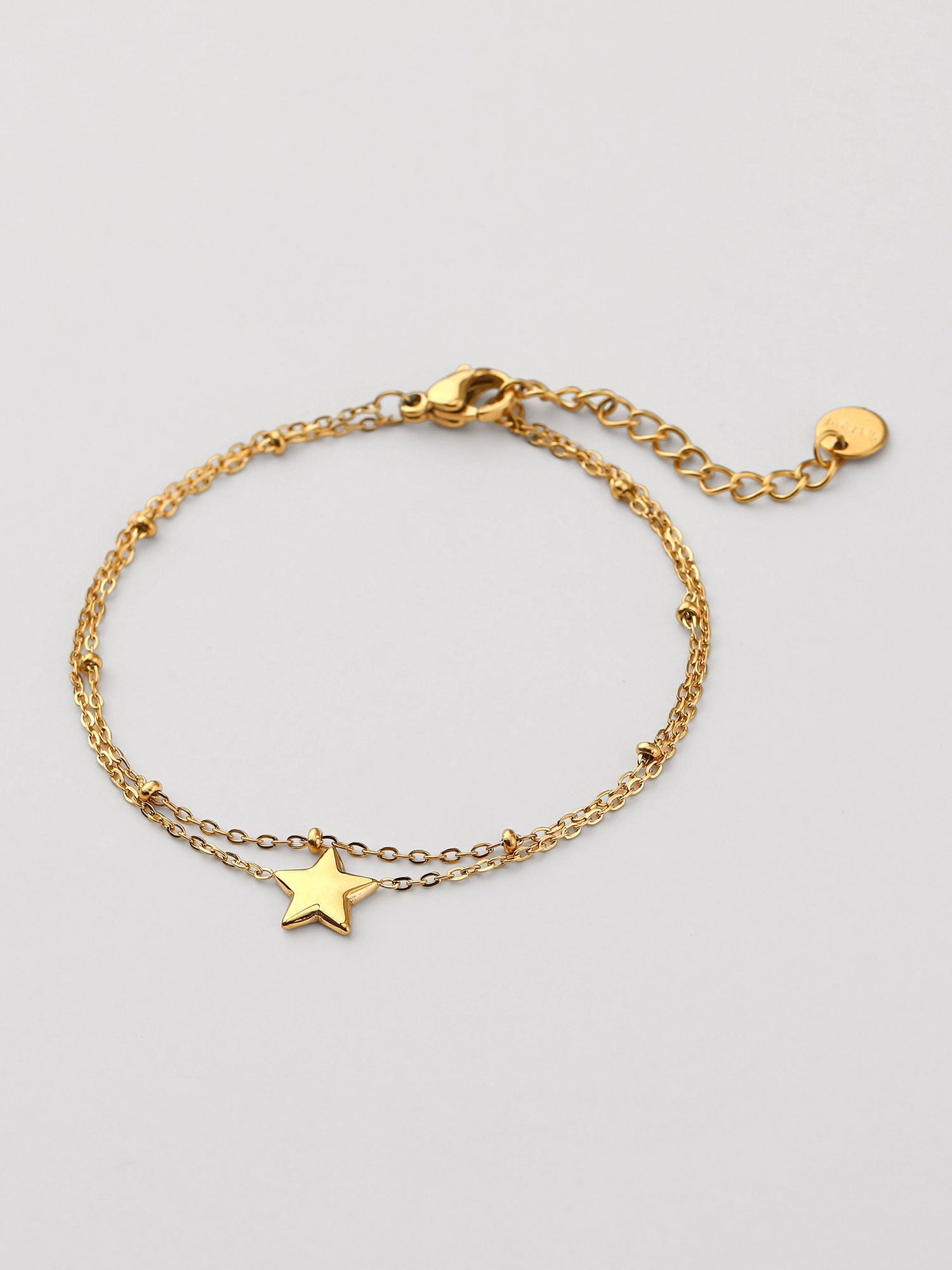 Pulseira simples com figura estrella dorada