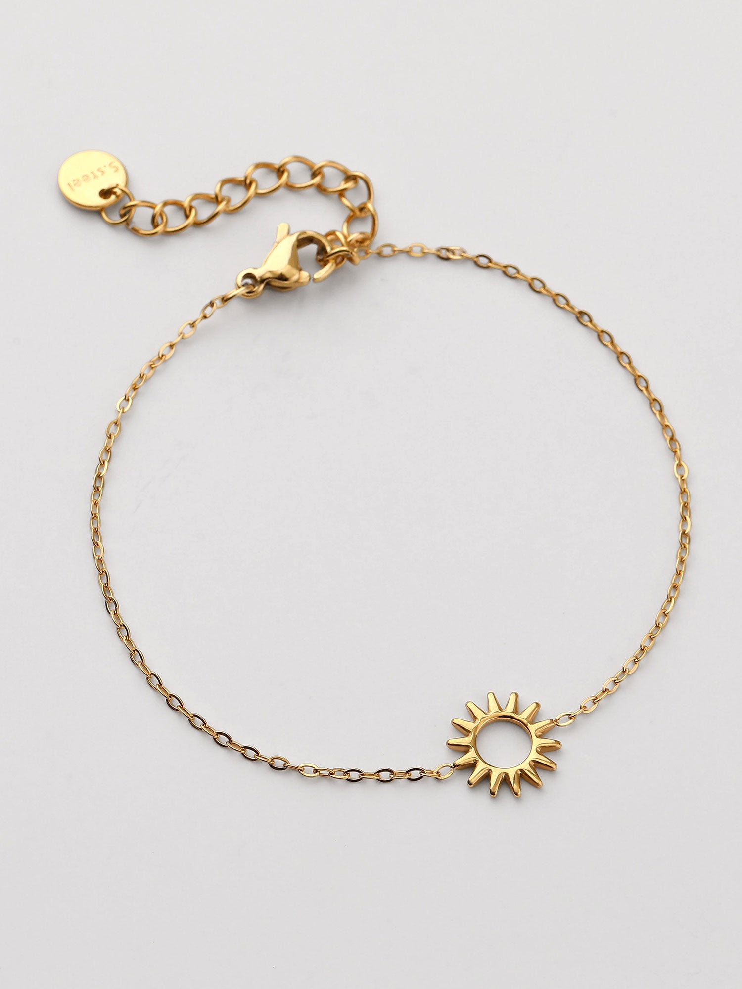 Pulseira simples com figura sol dorada