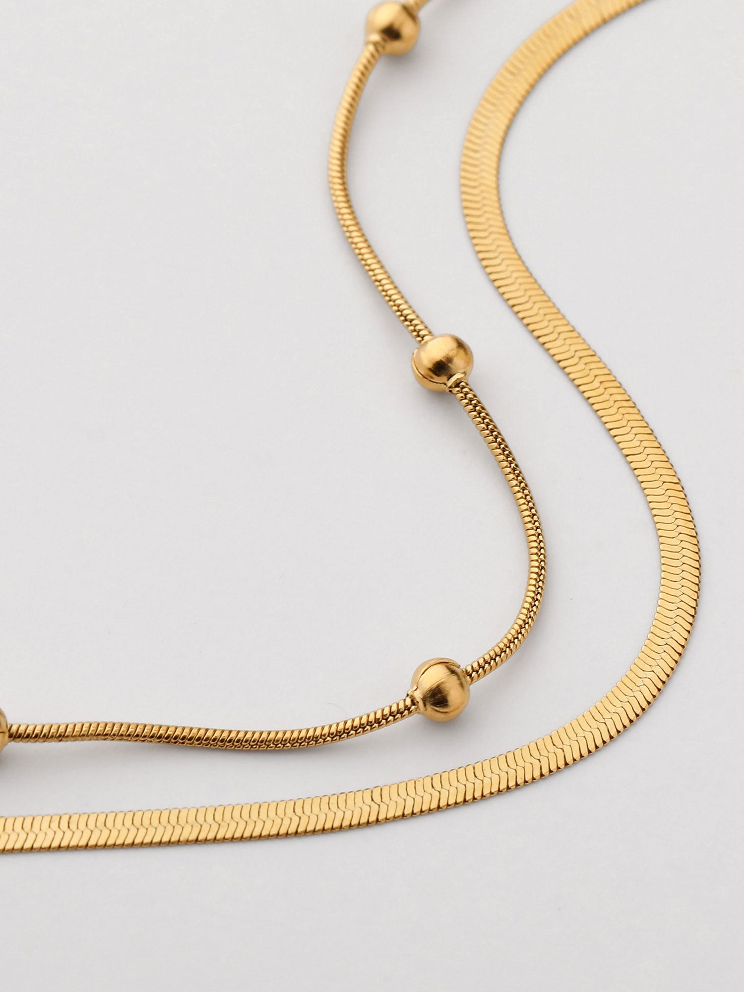 Pulseira duplo trenzada dorada