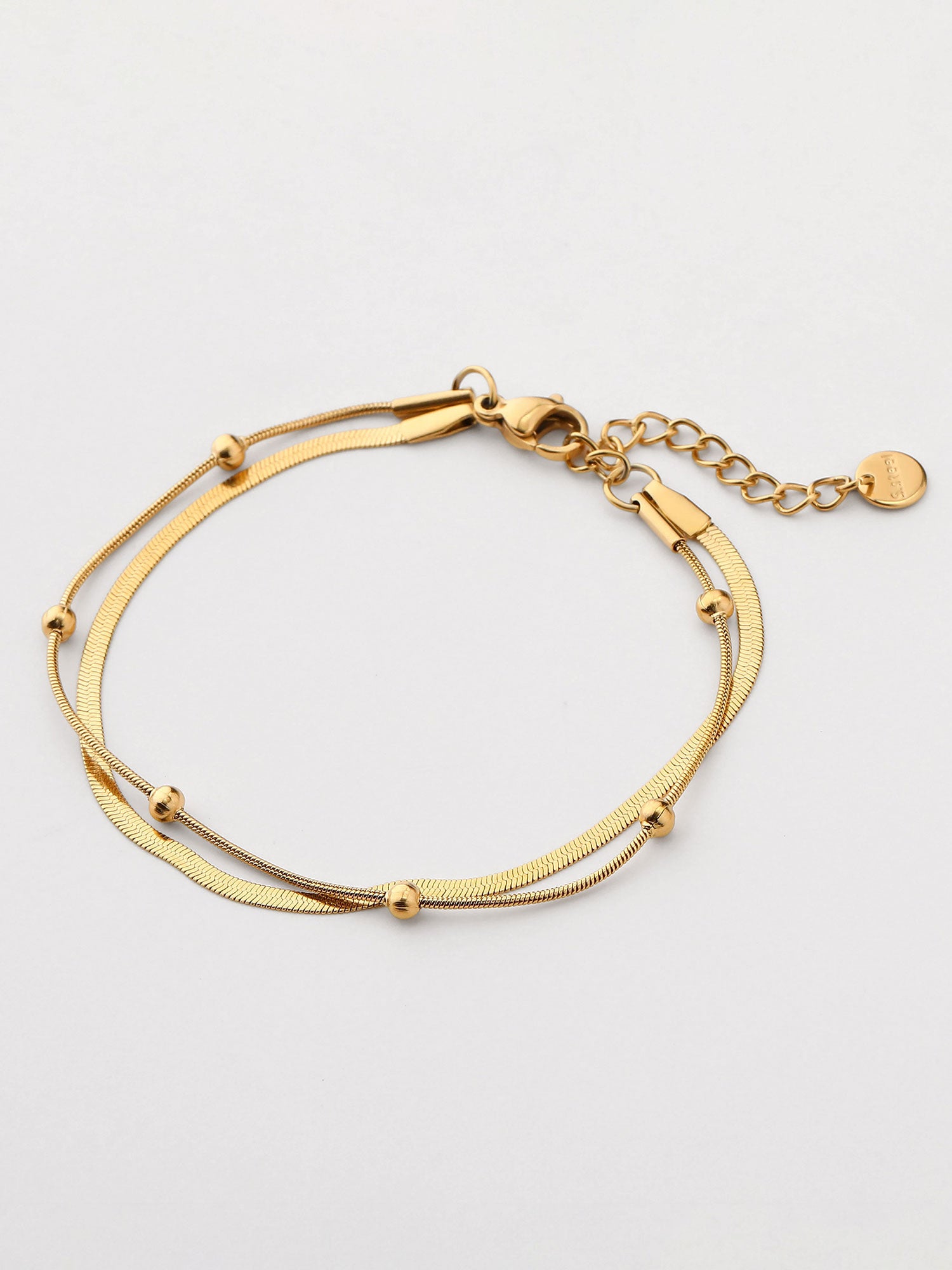 Pulseira duplo trenzada dorada