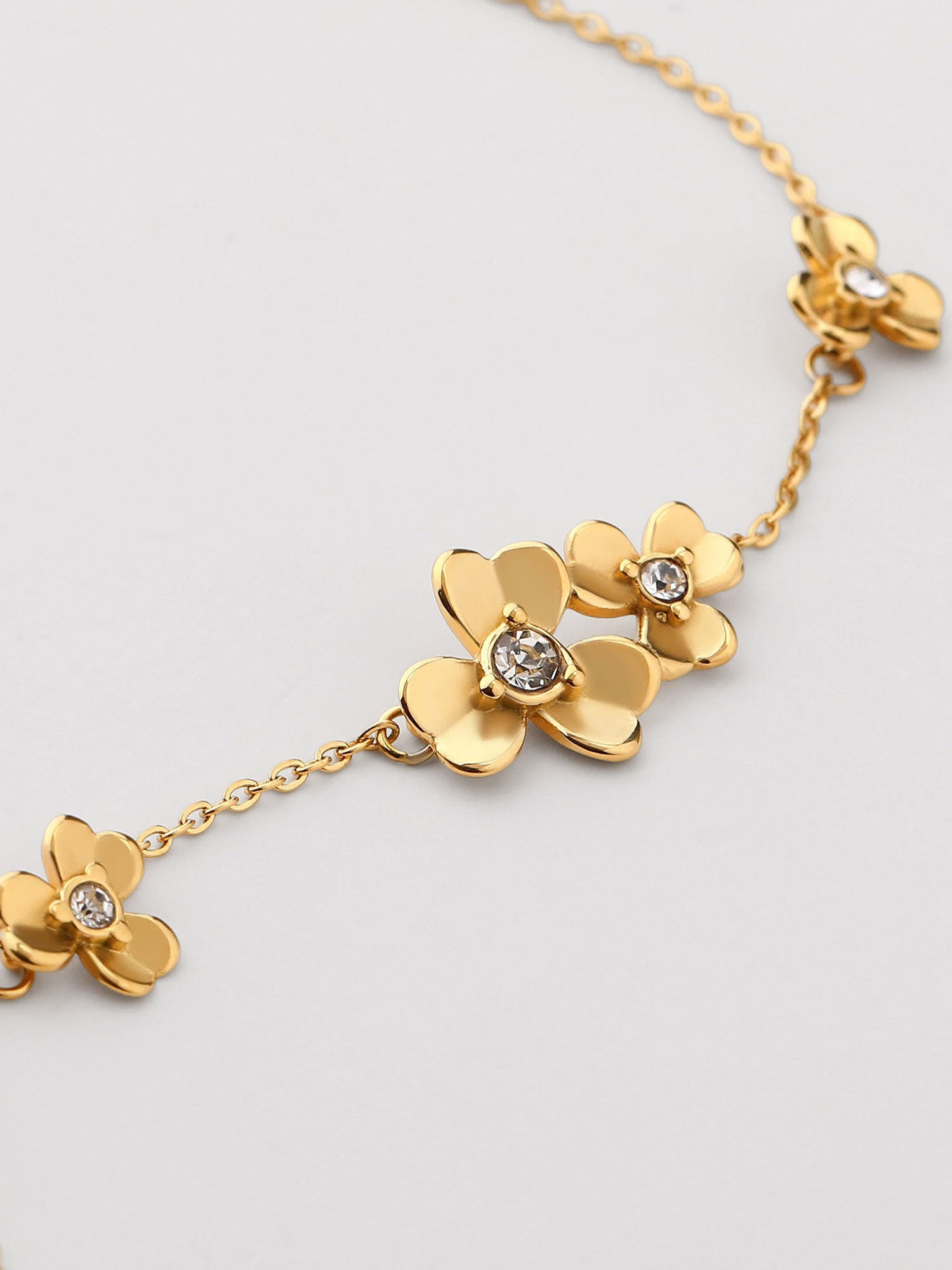 Pulseira com zircónia branca dorada