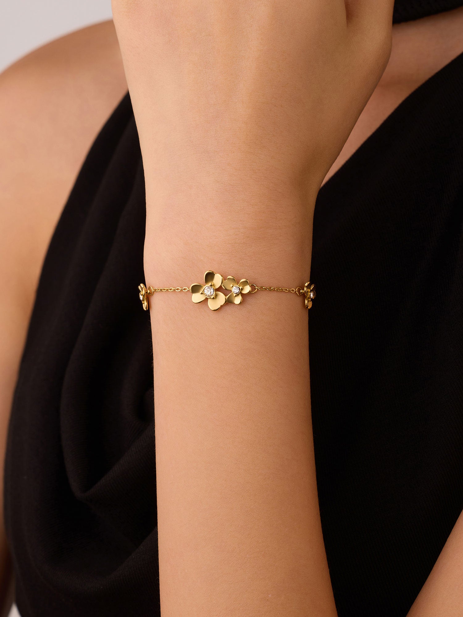 Pulseira com zircónia branca dorada