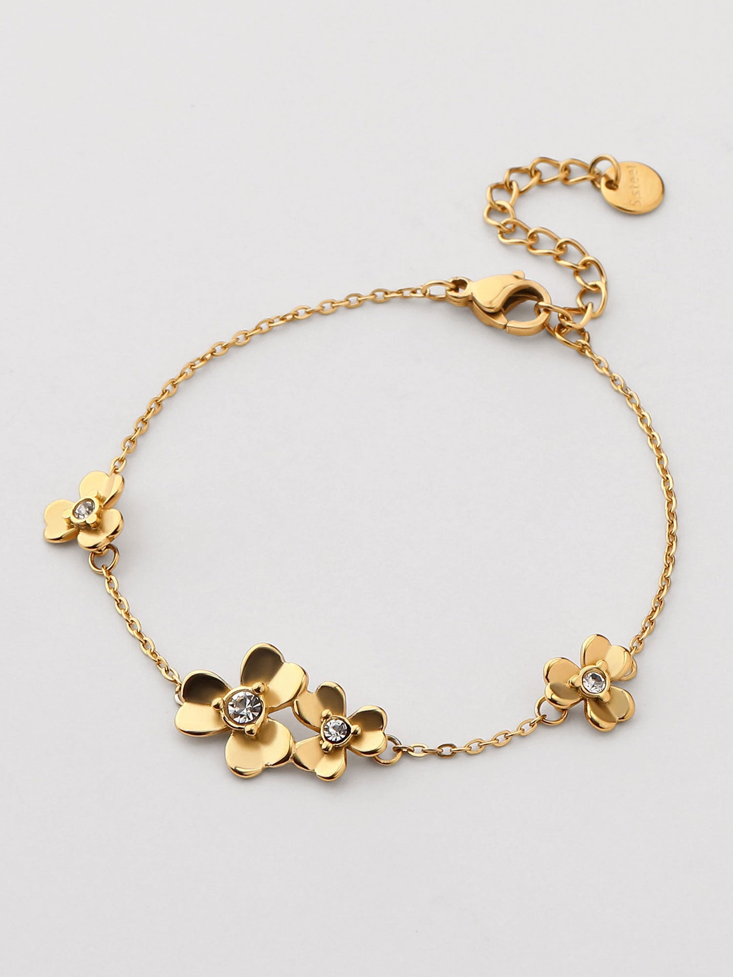 Pulseira com zircónia branca dorada
