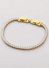 Pulseira de zircónias branca dorada