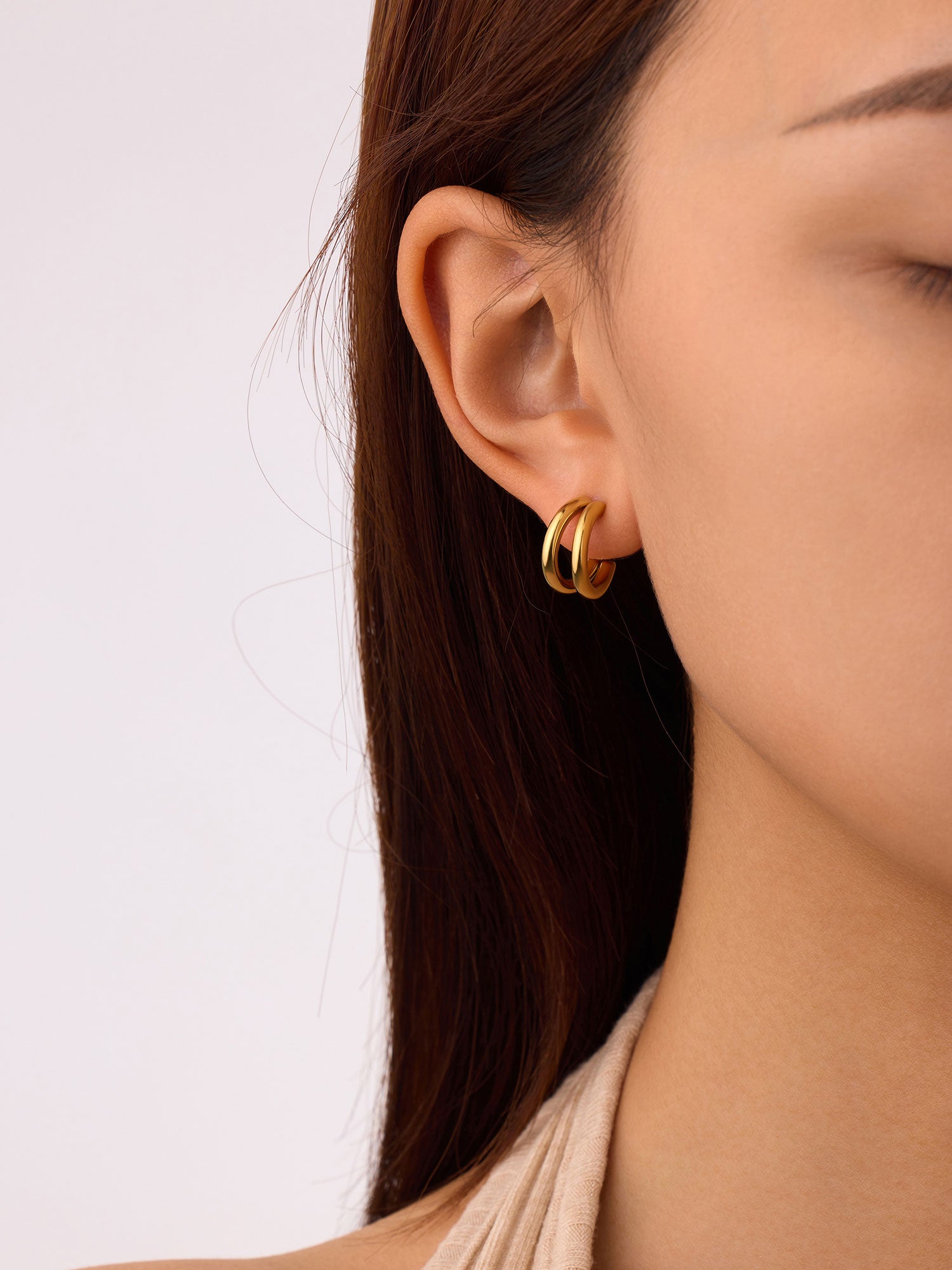 Brincos duplo aro Brisa dourados