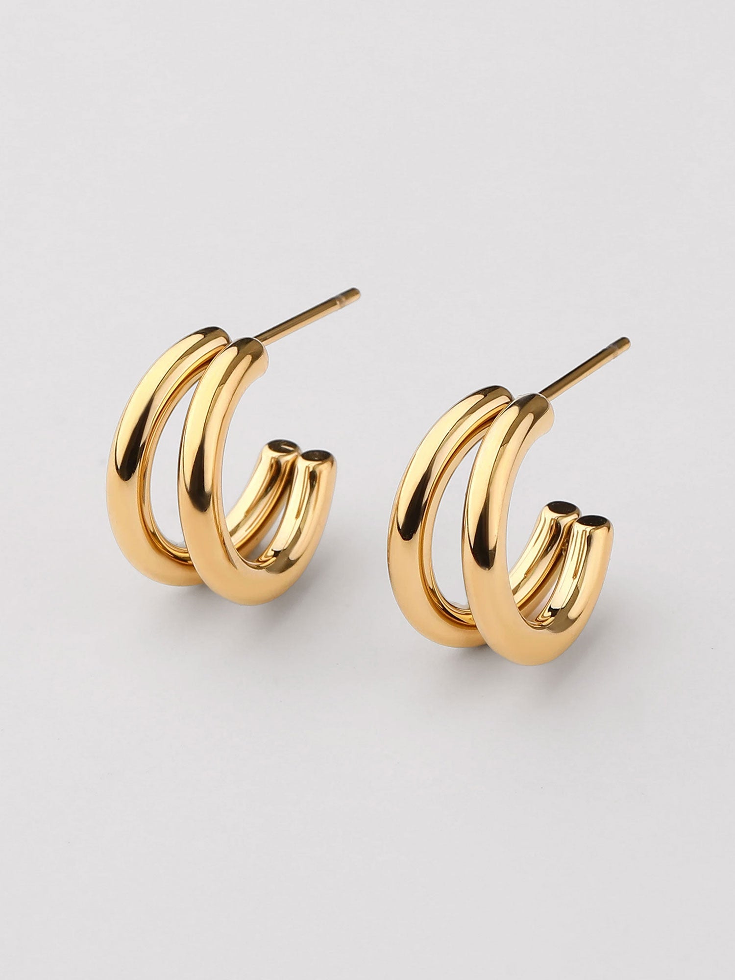 Brincos duplo aro Brisa dourados