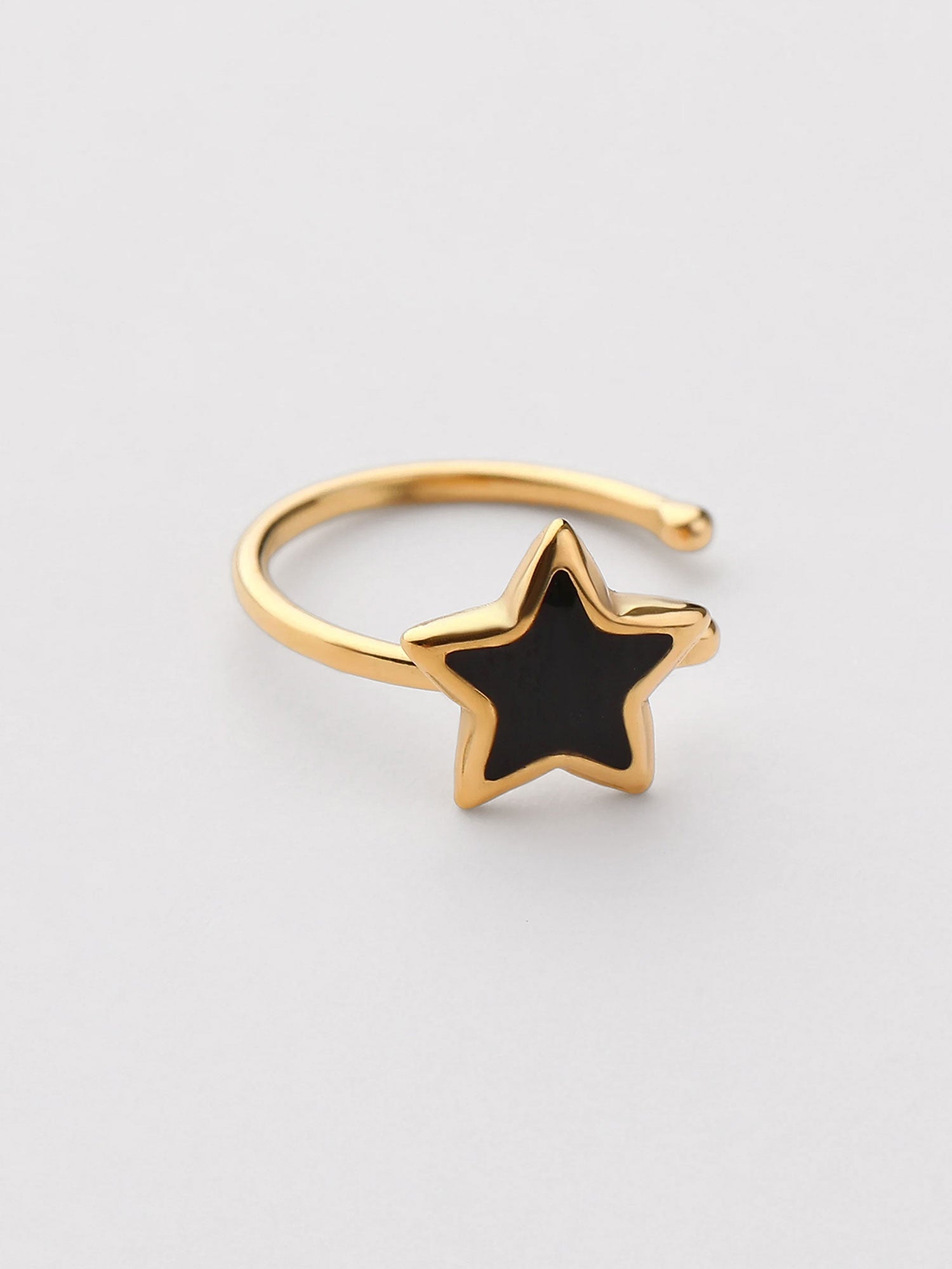 Ear cuff Yana estrela com zircónias pretas dourado