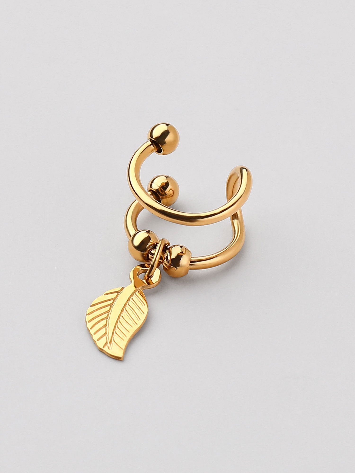 Ear cuff pena Liora dourado