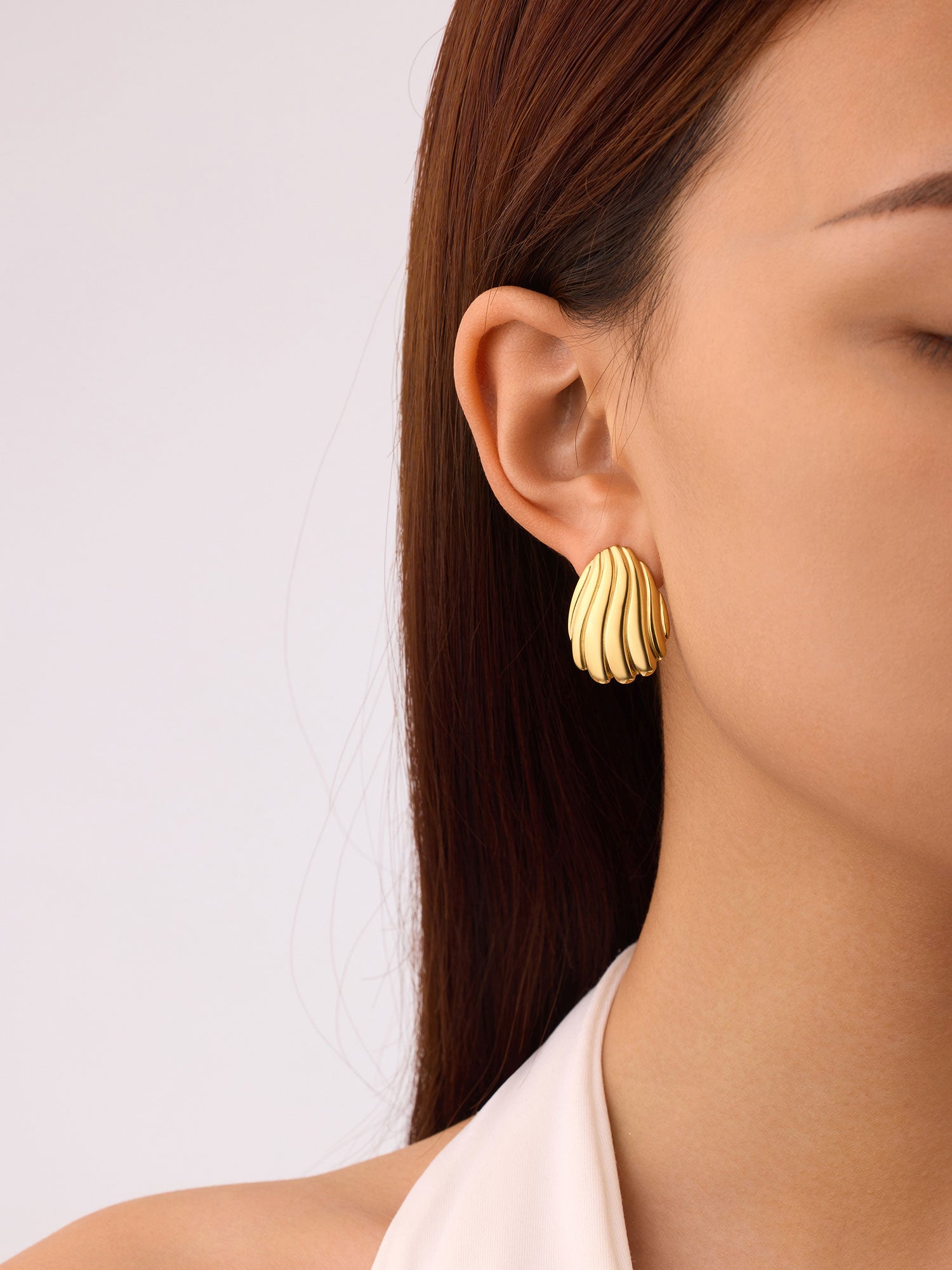 Brincos concha dourados