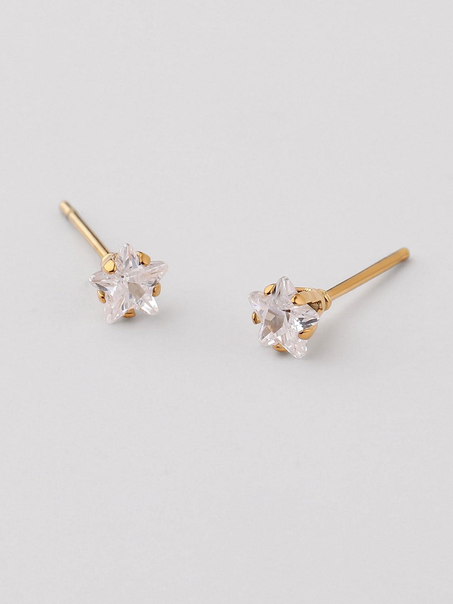 Brincos mini com zircónia dourados