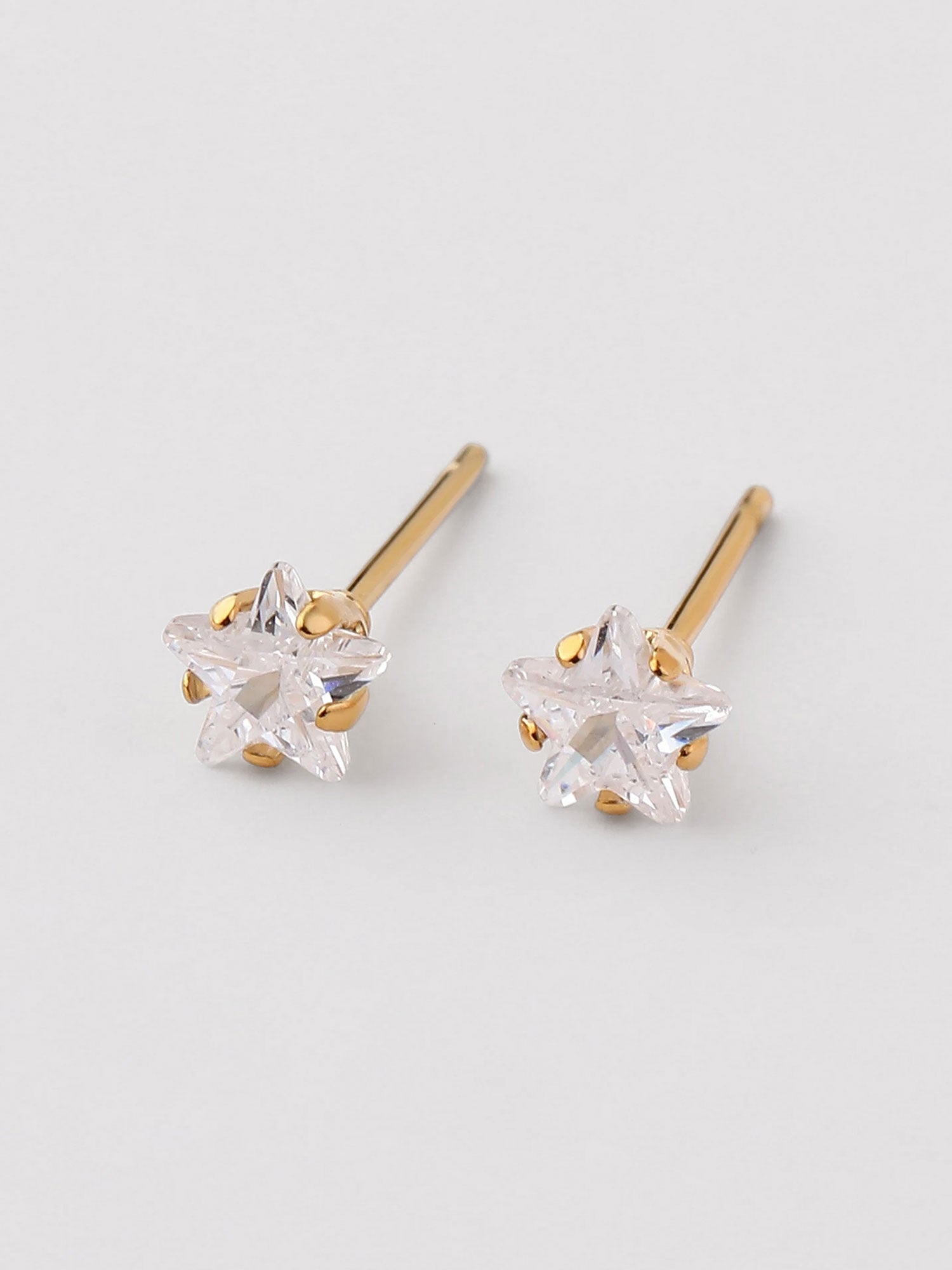 Brincos mini com zircónia dourados