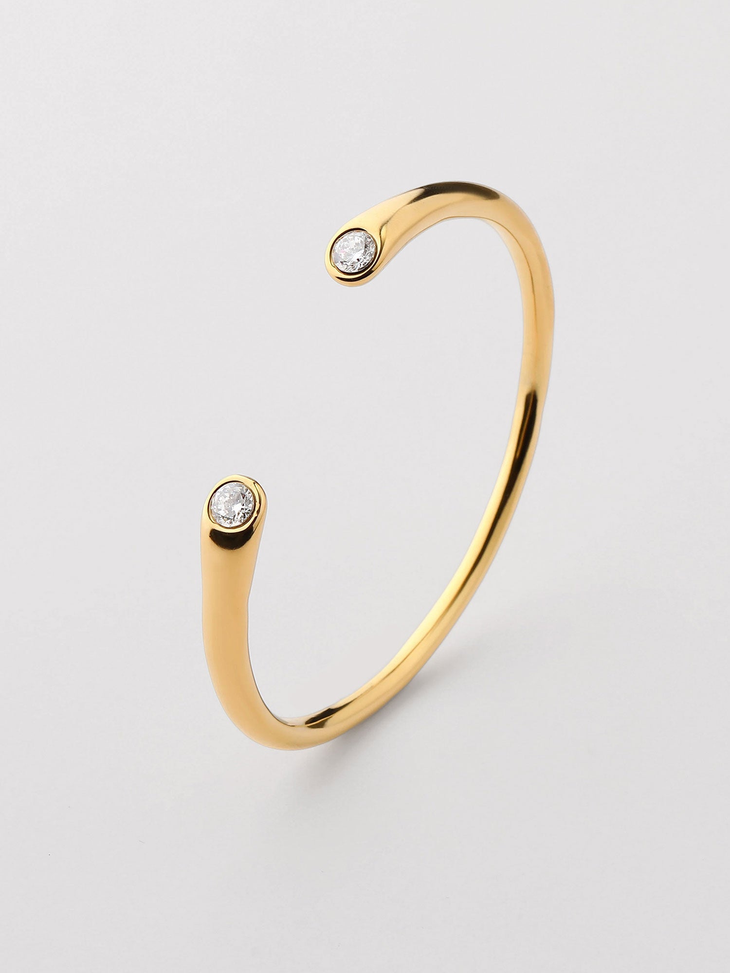 Bracelete fino zircónia blanco Dourado