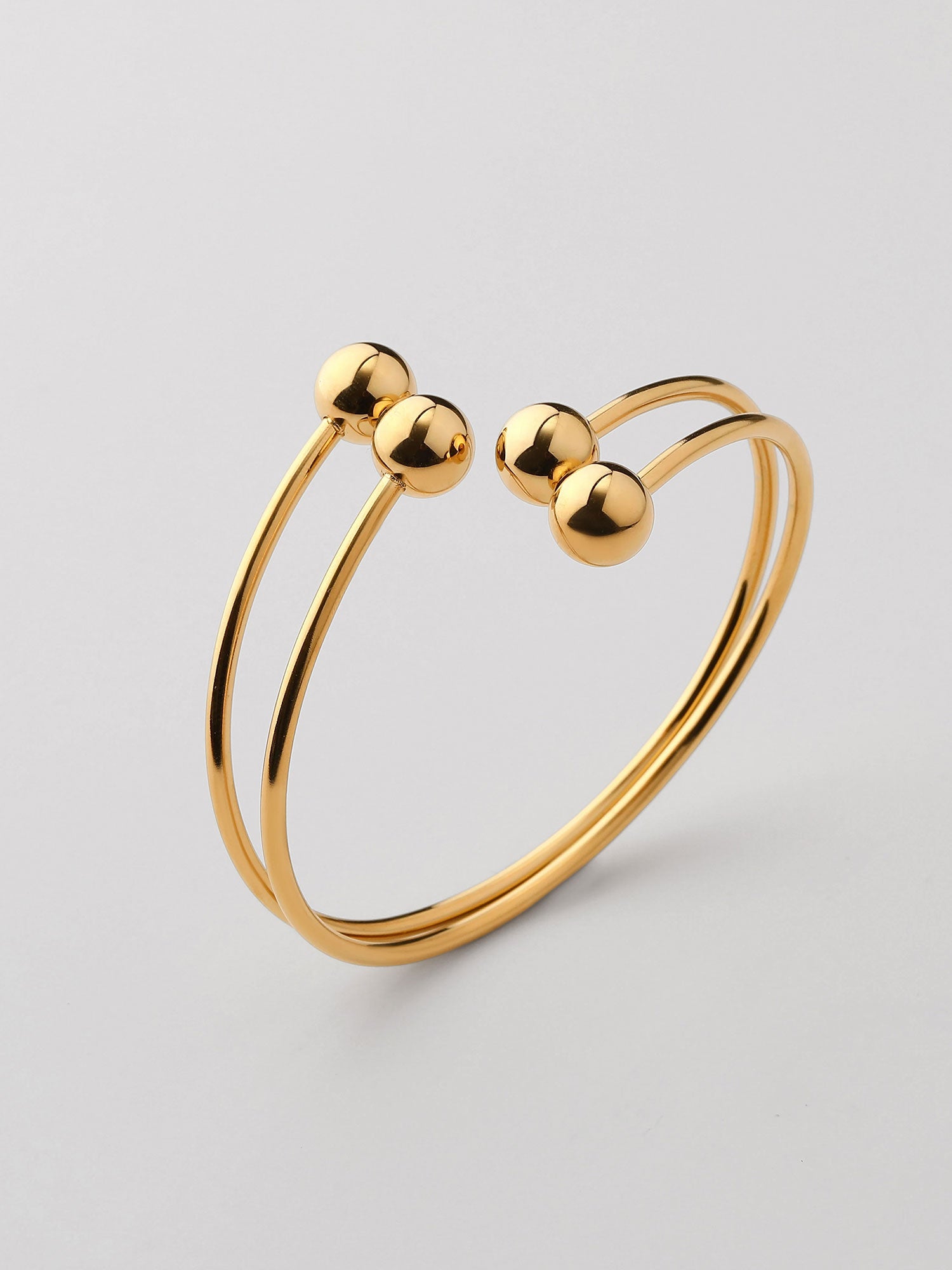Bracelete duplo fino com bolitas Dourado