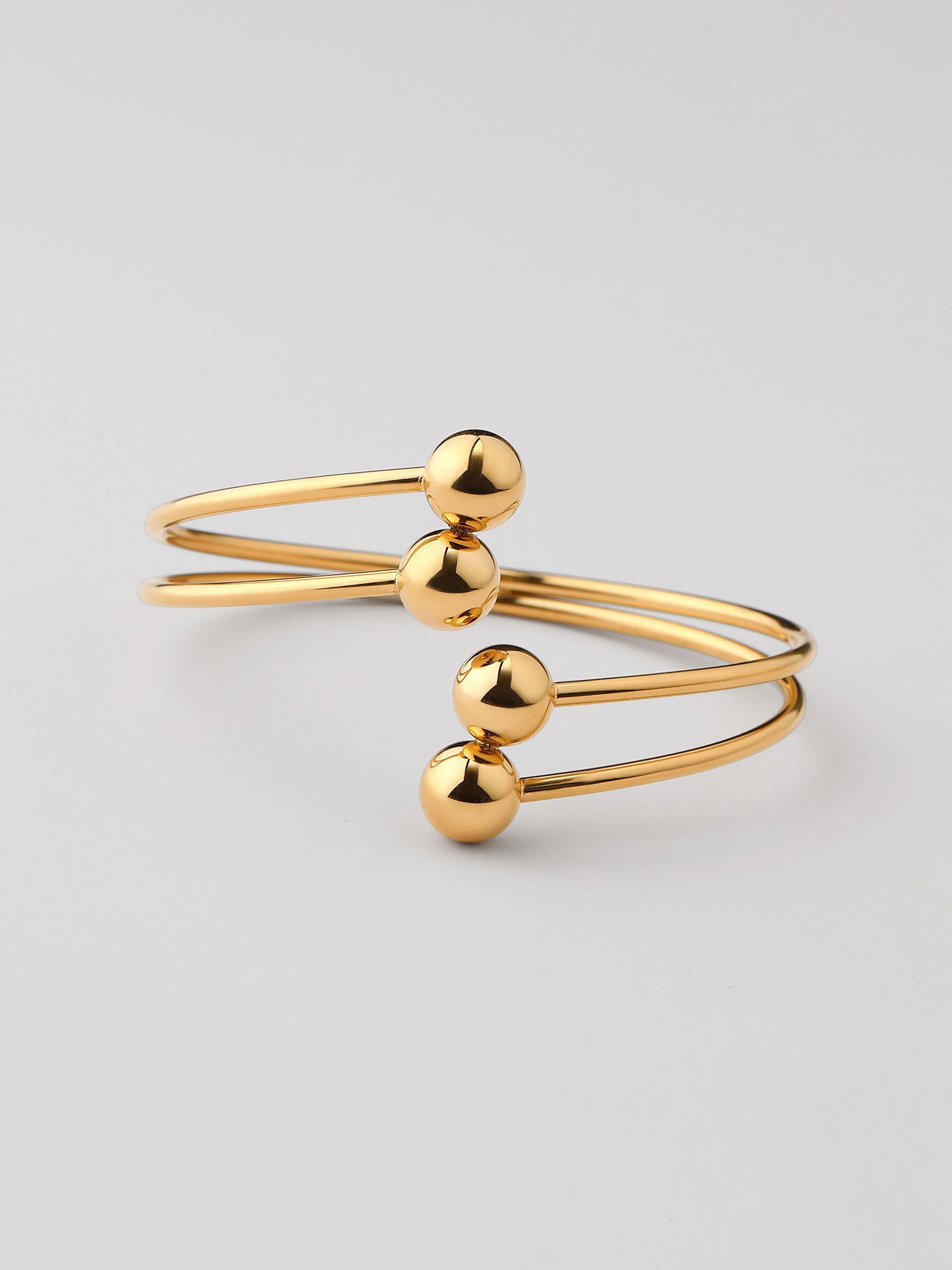 Bracelete duplo fino com bolitas Dourado