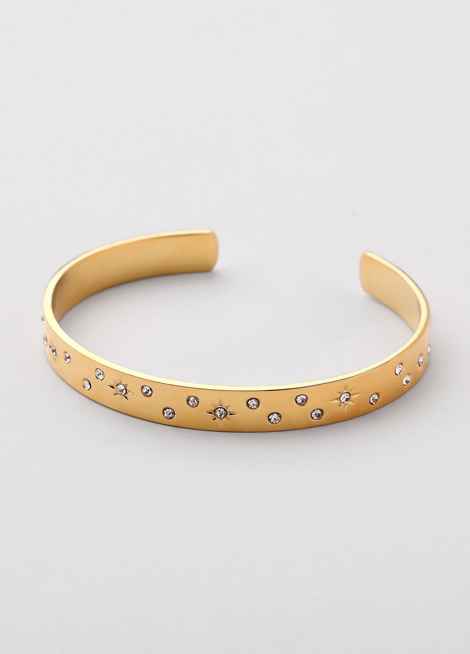 Bracelete zircónias aberto Dourado