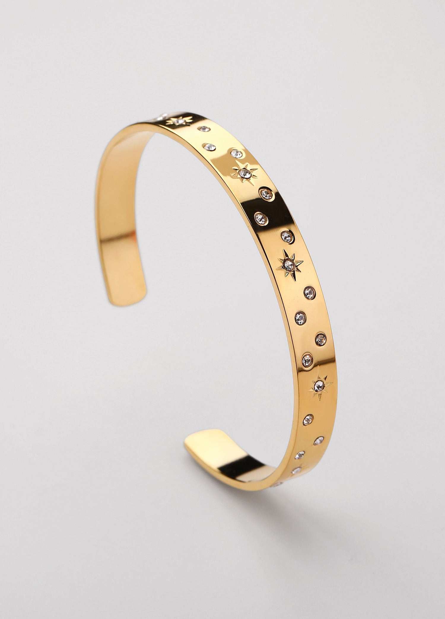 Bracelete zircónias aberto Dourado
