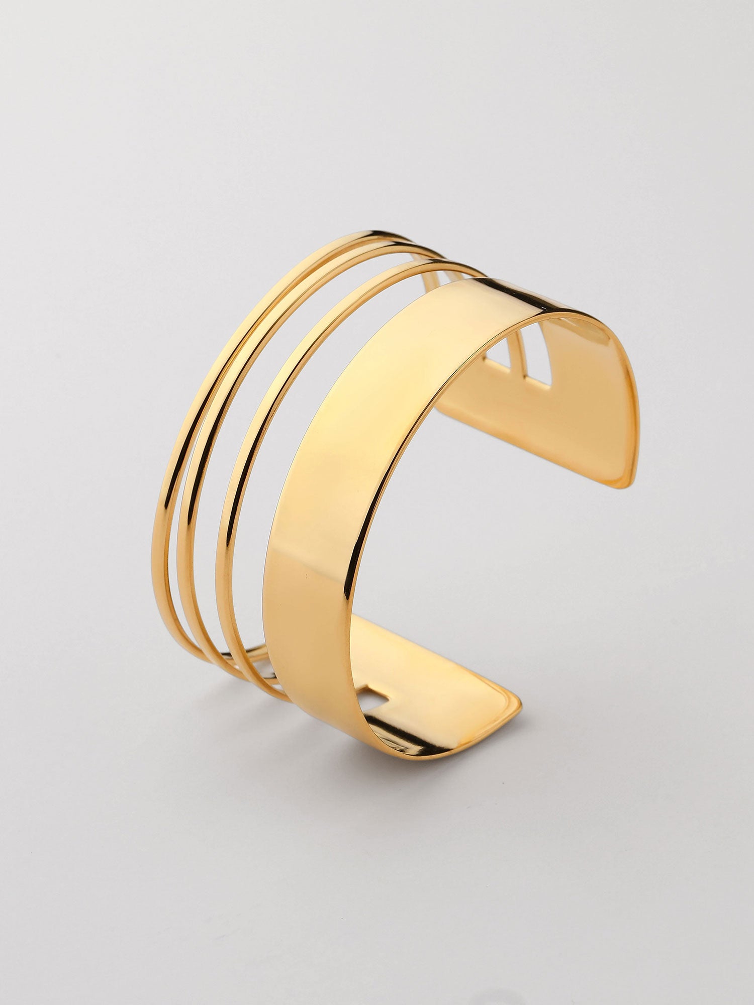 Bracelete aberto com formas Dourado