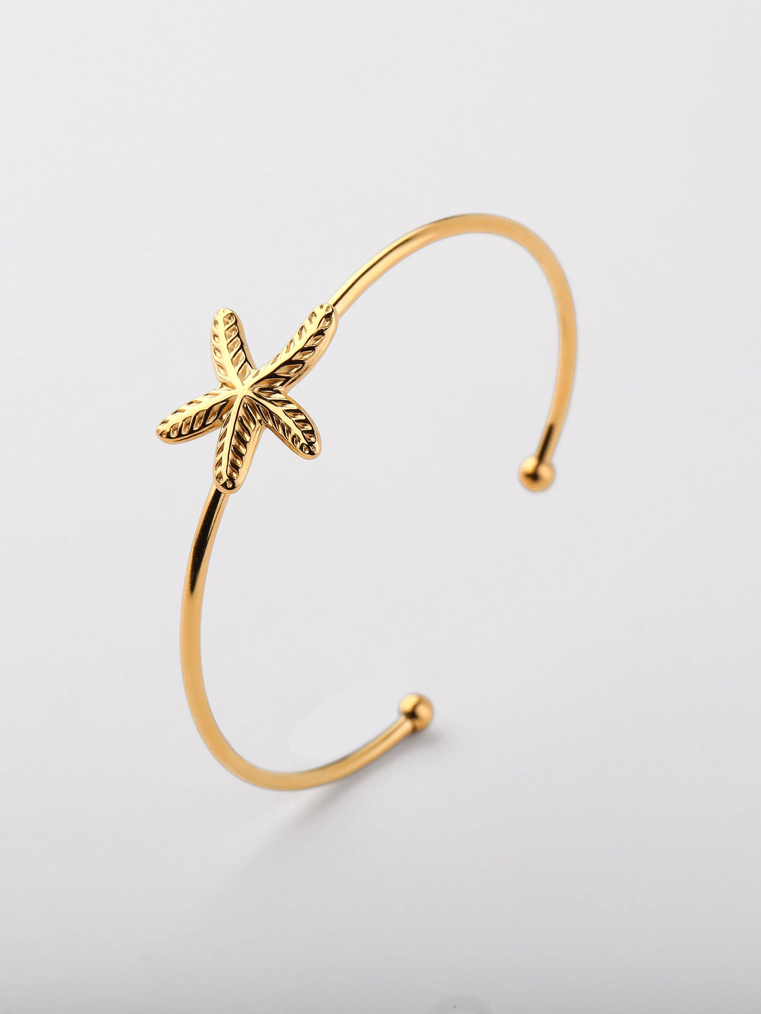 Bracelete aberto estrela-do-mar Dourado
