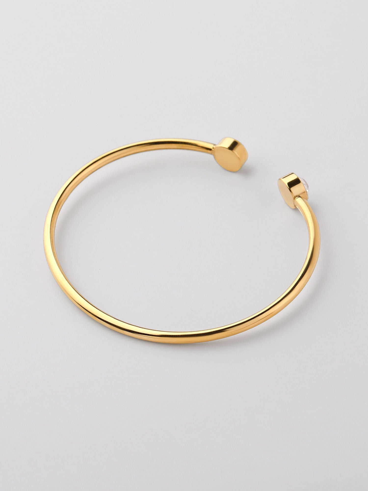Bracelete aberto zircónias blanco Dourado
