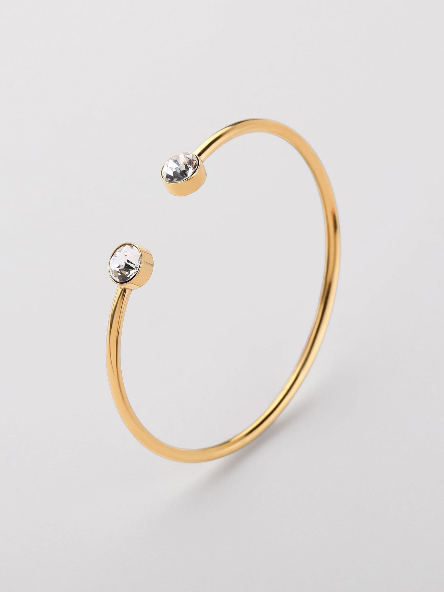 Bracelete aberto zircónias blanco Dourado
