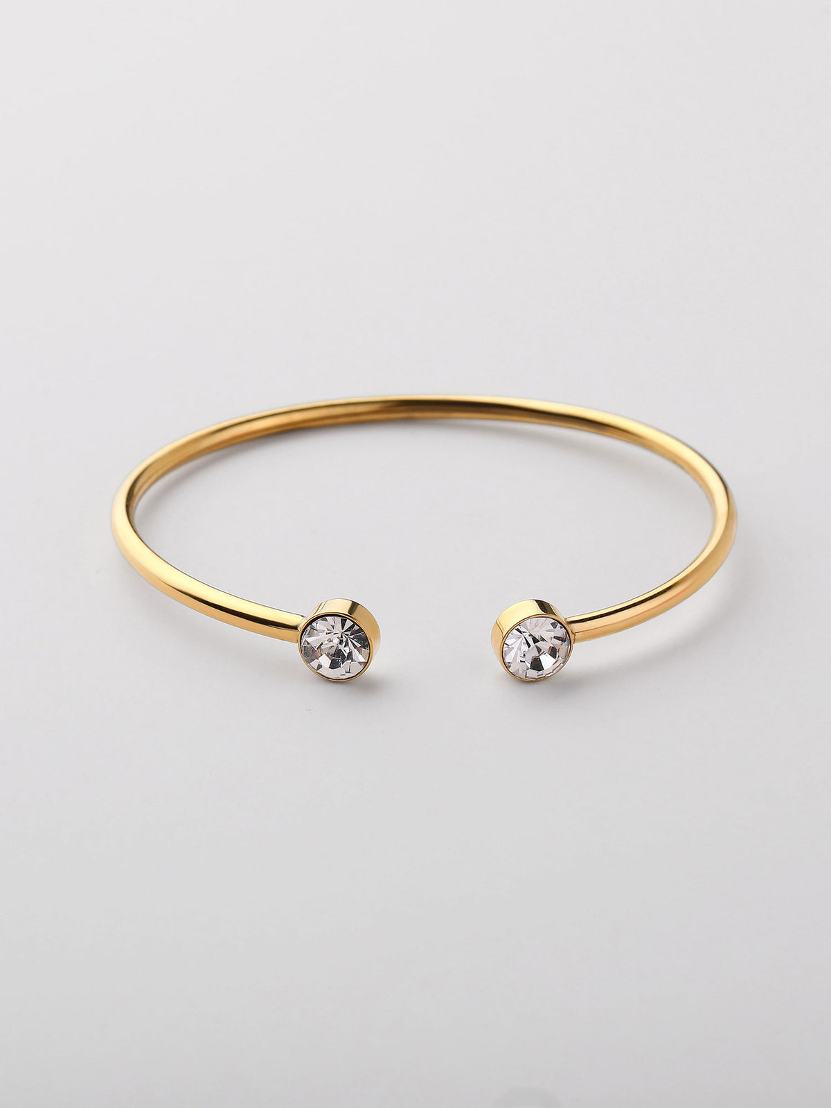 Bracelete aberto com zircónias brancas dourado
